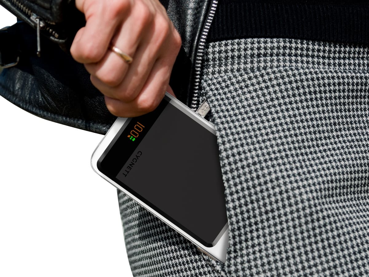 Slide 5: Cygnett MagSlim 10k Powerbank close up view, half inserted in a pant pocket