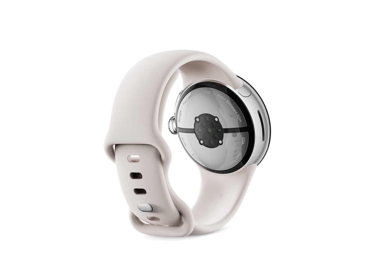 Slide 2: Google Pixel Watch 2 LTE 40mm   Polished Silver Aluminium Case with Porcelain Band rear view, three quarter right angle showing sensor and charging pins. Text on rear of watch face: Google, Pixel Watch 2, IP68, Sleep Tracking, SP02.