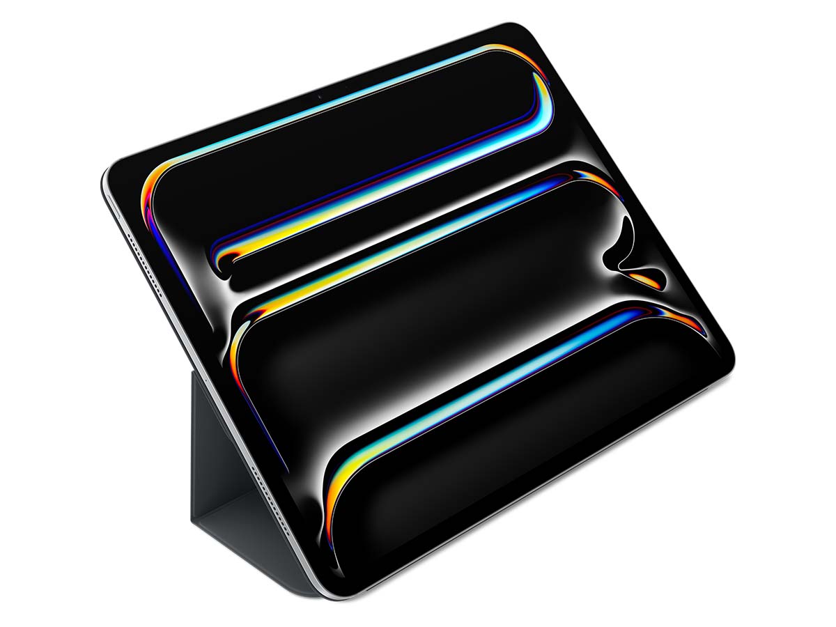 Slide 3: Apple Smart Folio for iPad Pro 13 inch (M4) Front view, three quarter angle, of the Apple Smart Folio for iPad Pro 13 inch (M4) in black, the Folio cover is folded back to allow the Ipad to rest up on an angle, the Ipad screen is visible