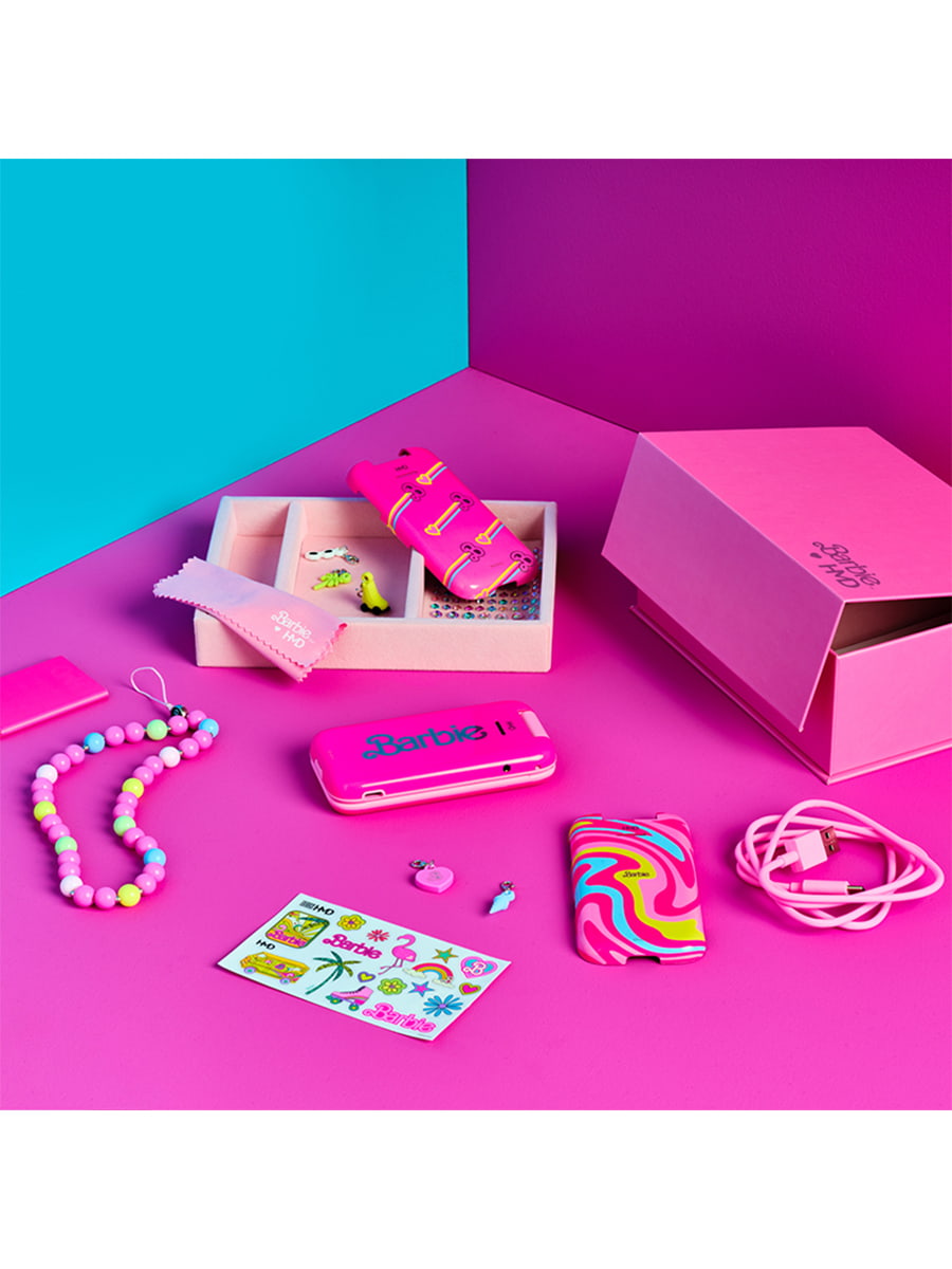 Image 2: HMD Barbie Phone Image shows the accessories included with this device, which are listed in the What's in the box section of this page. 