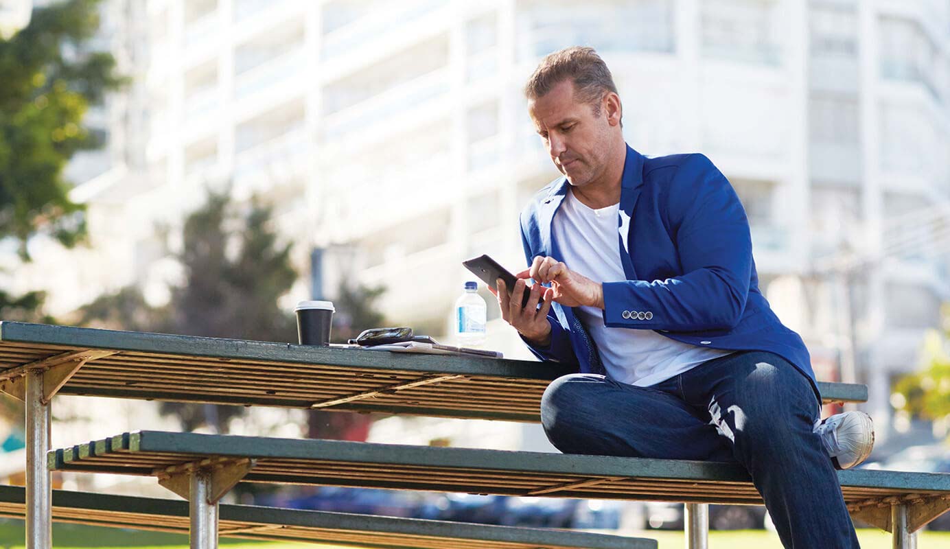 Man looking at mobile phone